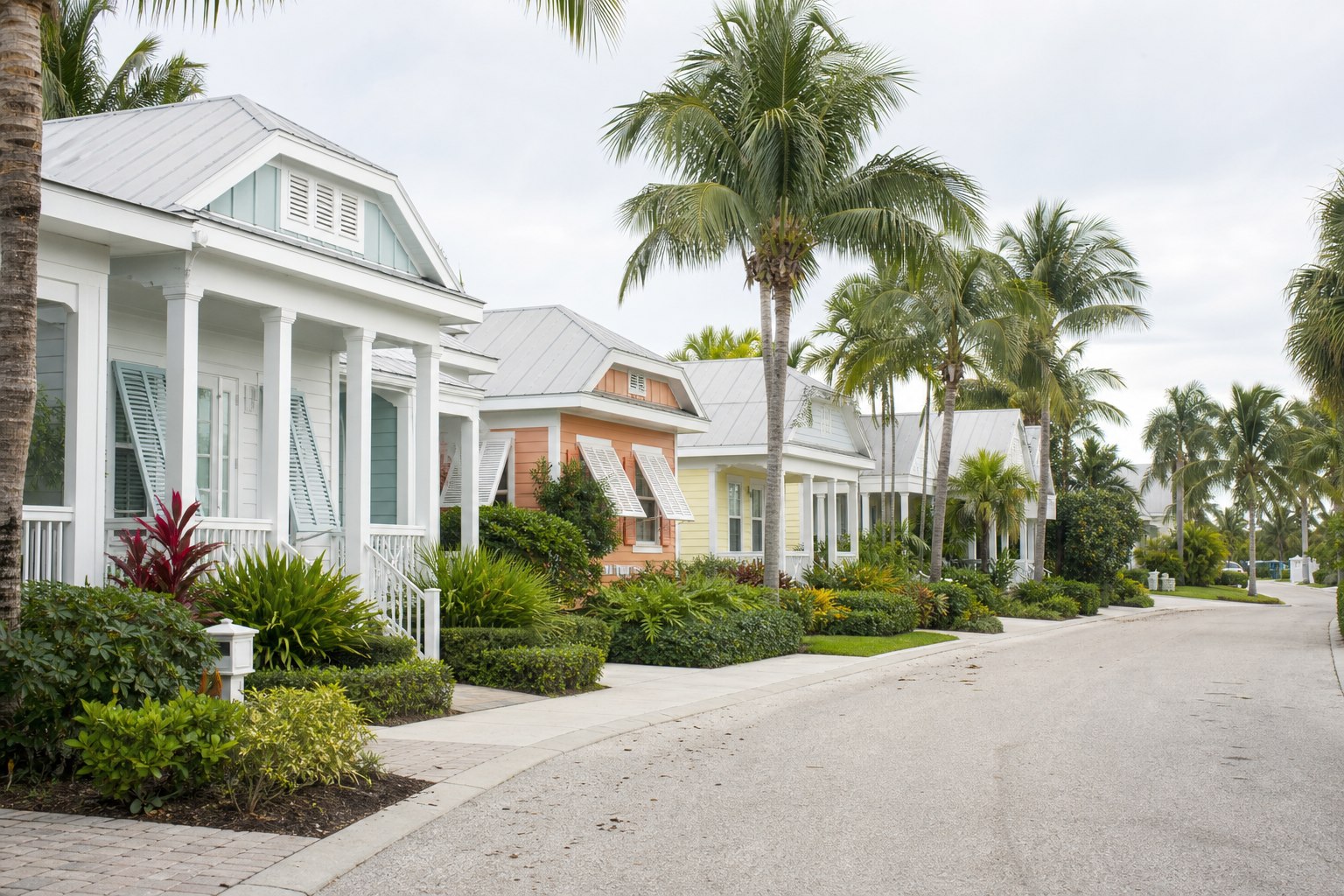 Florida coastal cottages with palms and tropical landscaping